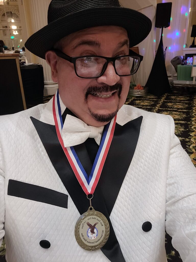 Joe Santo Yepez performing on stage